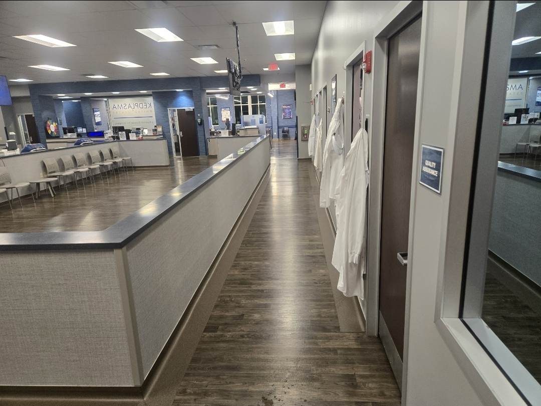 Clinic lobby and reception counter cleaned by All Improvement Cleaning Services