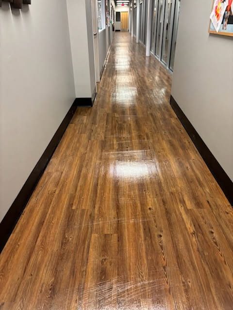 School hallway floor stripped, waxed and buffed to a high gloss by AICS in Urbana, IL